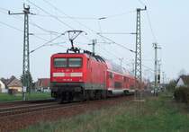 112 112-8 f�hrt gleich in den L�bbenauer Bhanhof ein. 08.04.2009