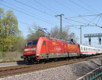 Die 101 047-9 mit Beklebung  150 Jahre Deutscher Feuerwehrverband  bringt den IC 2143 nach Leipzig. Fotografiert kurz vor Magdeburg Hbf, in H�he Platz des 17. Juni/Sachsenring. Eher ein Zufallsbild, ich mag eigentlich keine Nachsch�sse, habe die Beklebung gesehen und einfach abgedr�ckt ;-) 10.04.2009