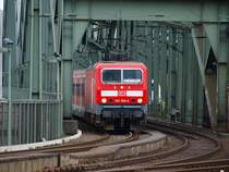 143 304-4 unterwegs als S6 auf den letzten metern der Hohenzollernbr�cke bei der einfahrt in den K�lner HBF.