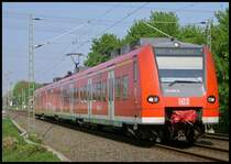 425 070 als  Rhein-Niers-Bahn  RB11075 nach Aachen am ehem. B� km 28.899 20.4.2009