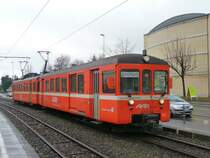AAR - Regio nach Aarau - Sch�ftland mit dem Steuerwagen BDt 85 und dem Triebwagen Be 4/4 15 unterwegs in Suhr am 07.02.2009