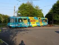 Linie 310 als Werbetr�ger f�r Hanibal Einkaufscenter. Bochum, Haltestelle Am Honnengraben. 21.04.2009.