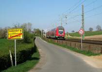 RE 21427 L�beck Hbf - Hamburg Hbf bei der Ortausfahrt in Reinfeld Richtung Altenfelde am 16.04.09. 