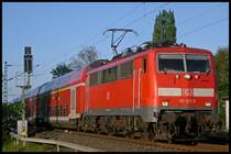 111 127 mit dem  Wupper-Express  RE10428 nach Aachen mit ca. +5 am Esig Geilenkirchen 22.4.2009