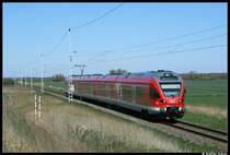 429 527 mit dem RE33214 aus Sassnitz zum Rostock Hbf am 19.04.09 in M�nchhagen.