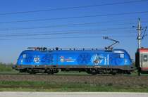 Detailansicht der 1116 080 vor dem EC690 am 25. April 2009.