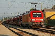 DB Railion 182 022 vor Suzuki Autozug Richtung Westen. Die Aufnahme entstand kurz nach Neulengbach im Abendlicht des 24.04.2009.