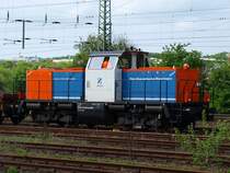 212 132-5 der Nordbayrischen Eisenbahn mit einem Schotterzug in Aachen West am 25.04.2009