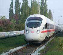 ICE-T Travem�nde als ICE73929 von Warnem�nde nach N�rnberg Hbf.bei der Durchfahrt um 07.10 Uhr im S-Bahnhof Rostock Holbeinplatz.(29.04.09)