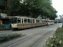 Eine Doppeltraktion aus DUEWAG-Statbahnwagen N8 der Dortmunder Stadtwerke in der Haltestelle Kampstra�e in Dortmund als Zug der Linie 403 nach Wickede am 28.09.2004.