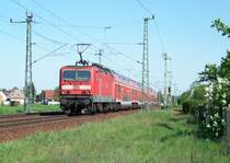 143 821-7 kommt hier mit der RB14 in den Ort von L�bbenau/Spreewald reingefahren. 01.05.2009