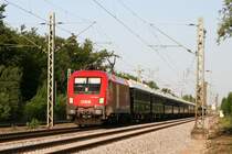 1116 048 mit DZ 13260 VSOE aus Budapest am Abend des 23.05.2009 in Haar (bei M�nchen).