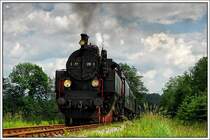 �GEG 77.28 am 1.6.2006 mit einem Fotopersonenzug zwischen Timelkam und Ampflwang.