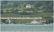 Zwei DPZ RABe 514 an einer der wenigen noch nicht zugebauten Stelle an der Z�rcher Goldk�ste nahe beim F�hranleger in Meilen. (24.06.2009)