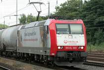 Die 185-CL 003 der Veolia mit Werbung durchf�hrt K�ln West am 04.07.2009