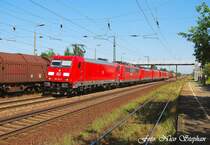 Bei sch�nstem Sonnenschein wartet dieser Lokzug,bestehend aus 185 351-4,151 142-7,189 045-8,185 368-8,185 293-8 sowie 185 260-7 im Bahnhof von Saarmund auf die Weiterfahrt nach Seddin (allerdings erst einige Stunden sp�ter) (27.07.09)
