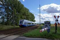 Usedomer B�derbahn  -  kurz vor Stralsund Hbf
UBB 24520 aus Swinoujscie Centrum ( Swinem�nde )
Aufgenommen in der Andershofer Dorfstra�e ( zu Stralsund )
26.07.2009