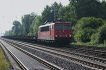 155 023-5 mit einem langen G�terzug,kurz vor der Durchfahrt des S-Bahnhofes Dedensen/G�mmer am 04.07.2009.