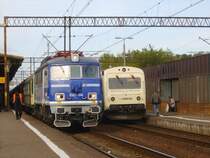 20.06.2009 Torun Glowny, EU07-046, D 75108 Poznan Glowny - Mikołajki/Lublin und MR 4001 PCC Arriva.