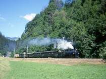 RhB Dampfextrazug f�r GRAUB�NDEN TOURS 3031 Landquart - Davos-Platz vom 20.06.1999 kurz vor Klosters mit Dampflok G 4/5 107 - B 2245 - B 2246 - A� 1102 - C� 2012 - D� 4052II - B� 2060 - B� 2102 - B� 2092. Beachtenswerte Besonderheit bei dieser Dampfzugfahrt sind die am Zugende angekuppelte offene gelbe Bernina-Aussichtswagen!