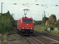 185 605-3 der HGK hat am 16.08.09 einen �ler aus Hohe Schaar am Haken und bringt diesen nun Richtung S�den. Aufgenommen bei der Durchfahrt in L�neburg.