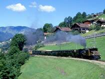 RhB Dampfextrazug mit Krokodilvorspann f�r GRAUB�NDEN TOURS 3031 von Landquart nach Davos-Platz vom 20.06.1999 kurz oberhalb K�blis mit E-Lok Ge 6/6I 411 - G 4/5 107 - B 2245 - B 2246 - A� 1102 - C� 2012 - D� 4052II - B� 2060 - B� 2102 - B� 2092.  