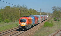 Am 22.4.2009 bespannte 1116 250  Feuerwehr 122  den R 2345, hier bei der ehemaligen �berwerfung in Strasshof.