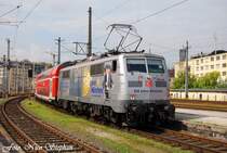 111 027-9 mit ihrer sch�nen 850 Jahre M�nchen-Werbung samt RE 30009 M�nchen Hbf. - Salzburg Hbf.,hat ihr Fahrtziel soeben erreicht (�sterreichurlaub 09.08.09)