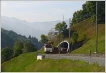 RE 1049 nach Davos Platz mit Ge 4/4 III 649  Lavin  verl�sst soeben den Saaser Tunnel. (24.09.2009)