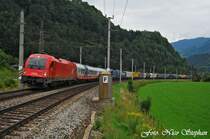 1216 014-9 passiert mit einer Rola nach Italien,eine der vielen Kurven zwischen St.Johann im Pongau und Schwarzach-St.Veit (�sterreichurlaub 11.08.09) 