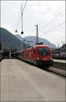 1116 134 verl�sst mit dem OEC 669  Astronomie-Jahr 2009 , Bregenz - Graz Hbf, am Haken den Bahnhof Kufstein. (02.08.2009)