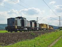 Locon 217 und 218 auf ihrer Fahrt mit einem Bauzug in Richtung Bebra. Aufgenommen am 26.09.2009 zwischen Friedlos und Mecklar.