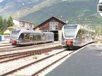 Vinschgerbahn,Ein Stadler GTW 2/6 vor dem Lokschuppen in Meran.Ein
Zug ist gerade bei der Ausfahrt Richtung Mals.Meran 06.05.05