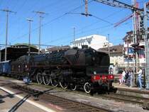 Verein 241.A.65 ex SNCF Dampflok 241.A.65(1931). Kurzer Zwischenstop im Bahnhof Olten am 1.5.2005.Schnell noch ein Foto, bevor sich der Dampfzug wieder fauchend in Bewegung setzt.