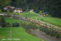 1116 038-9 ist mit einem gemischten G�terzug von Schwarzach nach M�nchen unterwegs,bei St.Johann im Pongau aus unserer Ferienwohnung herausfotografiert (�sterreichurlaub 14.08.09)