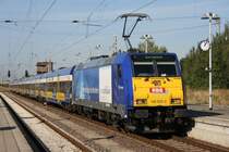 146 520 mit X 80003 in G�strow auf dem Weg nach Warnem�nde.