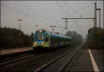 ET 018 erreicht p�nktlich als WFB39717 (RB66 „TEUTO-BAHN“) Osnabr�ck Hbf – M�nster(Westf)Hbf, den Haltepunkt Westbevern-Vadrup. (06.10.2009)
