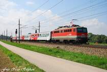In der Gegenrichtung kam 1142 617-8 mit REX 3016 Linz Hbf. - Salzburg Hbf. daher,Pasching (�sterreichurlaub 18.08.09)