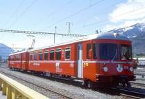 RhB Reserve-Vorortpendelzug am 25.04.1999 in Landquart mit Triebwagen Be 4/4 512 - ABDt 1716. Hinweis: dieser zweiteilige Kurzpendel steht als Einsatzreserve bereit f�r Vorortpendel-Verst�rkung oder als Ersatzzug bei Versp�tung oder bei Betriebsst�rung. Dieser Zug war am 14.13.1999 zwischen Filisur und Davos-Platz im Planeinsatz (eigene Sichtung). 