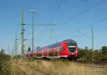 RE 21425 L�beck Hbf - Hamburg Hbf hat soeben den Bahnhof von Bad Oldesloe verlassen und ist nun auf dem Weg nach Hamburg Hbf. Aufgenommen am 19.08.09.