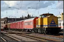 203 311-6 vor einem Hilfszug, abgestellt im Hbf Stralsund. am 09.07.09 