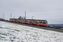 Auch bei uns lag am letzten Wochenende noch ein wenig Schnee, der allerdings schon wieder verschwunden ist. Am 6.12.09 f�hrt ein Zug der Forchbahn mit den Be 4/6 72, 65 und 67 von Scheuren Richtung Neuhaus.