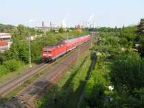 Berliner Regionalverkehr.RE Dosto von Spandau-West kommend in Richtung Stadtbahn bei der Olympischen Br�cke.Bln.24.05.05