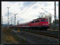 110 432 scheibt einen Fussball-Sonderzug Richtung Sinsheim (Elsenz). Aufgenommen in Meckesheim am 12.12.2009