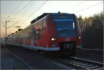 Quitschologie: Einfacher Mittelhessenexpress mit 425 016-3 (Fotostandort ist ein �ffentlicher Parkplatz, Dezember 2009).