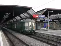 DSF - Triebwagen RBe 4/4 1405 mit Gep�cksteuerwagen bei einer Extrafahrt bei der Ausfahrt aus dem Bahnhof Z�rich am 18.12.2009
