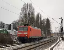 145 031-1 f�hrt am 20.12.09 mit einem Containerzug aus Hamburg-Waltershof �ber die Unterelbbahn Richtung Maschen Rbf. 