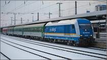 Ein bunter Alex mit 223 071 nach Prag bei der Abfahrt in N�rnberg. (Dezember 2009)