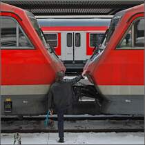 Das Bussi klappt nicht ganz, da muss man mit einem gezielten Tritt nachhelfen. Immerhin funktioniert das besser als bei den diversen ICEs, Talysen und Eurostars. 610 002-8 und 610 007-6 in N�rnberg (Dezember 2009)