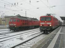 Hier 232 704-7 und 114 021-9 mit einem RE3 von W�nsdorf-Waldstadt nach Stralsund Hbf. Angerm�nde, am 22.12.2009.
